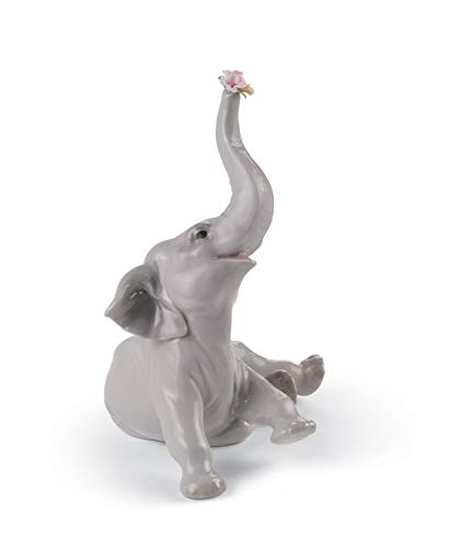 LLADRÓ Glossy Porcelain Figure of Baby Elephant with Pink Flower. Decorative Porcelain Animal Figurine.