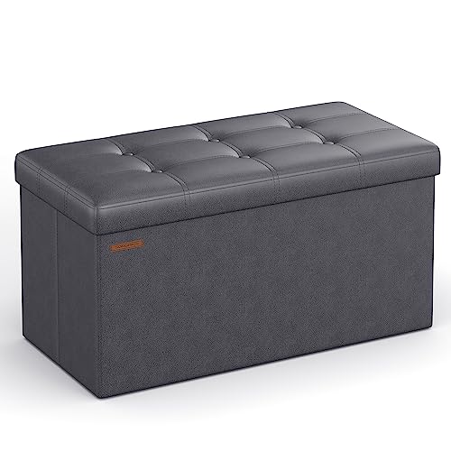 SONGMICS 30 Inches Folding Storage Ottoman Bench, Storage Chest, Footrest, Coffee Table, Padded Seat, Faux Leather, Holds up to 660 lb, Dark Gray ULSF040G01