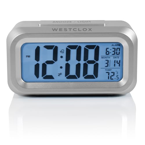 Westclox Travel Alarm Clock with Large Digital Display and Blue Backlight on Demand, Alarm Clock, Month/Date and Temperature Display with Ascending 5 Minute Snooze Alarm, Silver