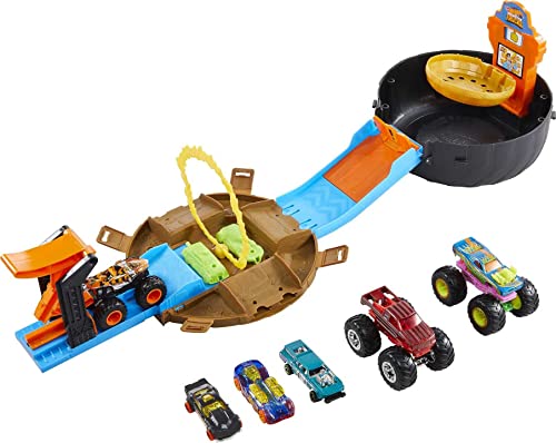 Hot Wheels Monster Trucks Stunt Tire Playset with 3 Toy Monster Trucks & 4 Hot Wheels Toy Cars in 1:64 Scale (Amazon Exclusive)