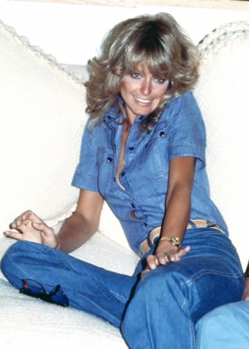 Farrah Fawcett wearing a blue jean shirt and pants 1970s. Photo: Oscar Abolafia (farrahfawcett045) Poster Print (16 x 20)