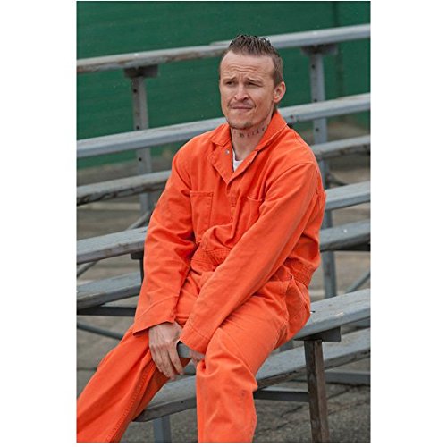 Justified Damon Herriman as Dewey Crowe Seated in Prison Yard 8 x 10 Inch Photo