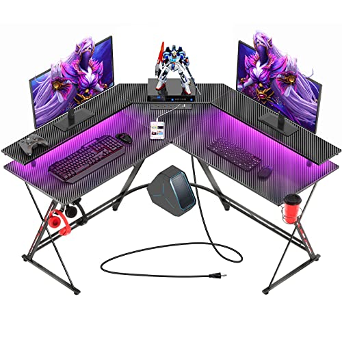 SEVEN WARRIOR L Shaped Gaming Desk with LED Lights & Power Outlets, 50.4” Computer Desk with Monitor Stand & Carbon Fiber Surface, Corner Desk with Cup Holder, Gaming Table with Hooks, Black